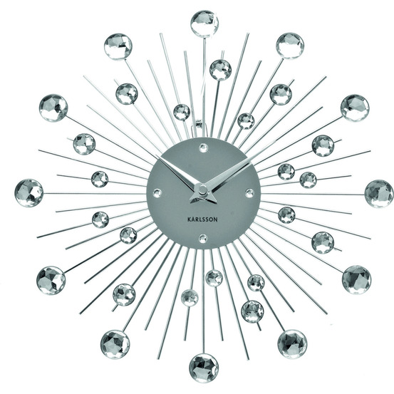 Horloge ronde en métal sunburst 30 cm chrome