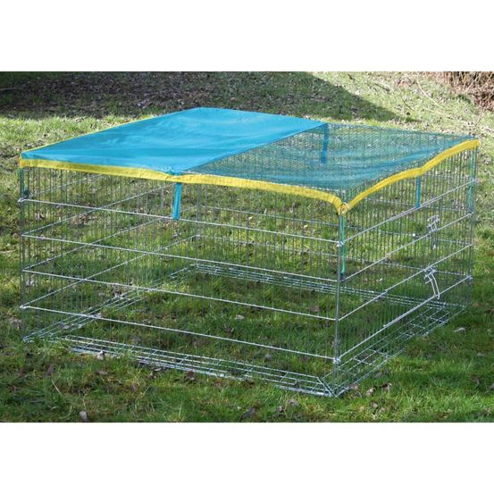 Enclos extérieur pour petits animaux avec barrière de fuite