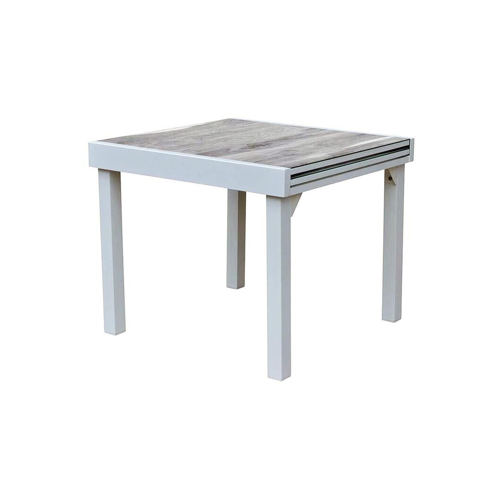 Table modulo 4/8 personnes structure aluminium blanche, plateau en verre décors bois