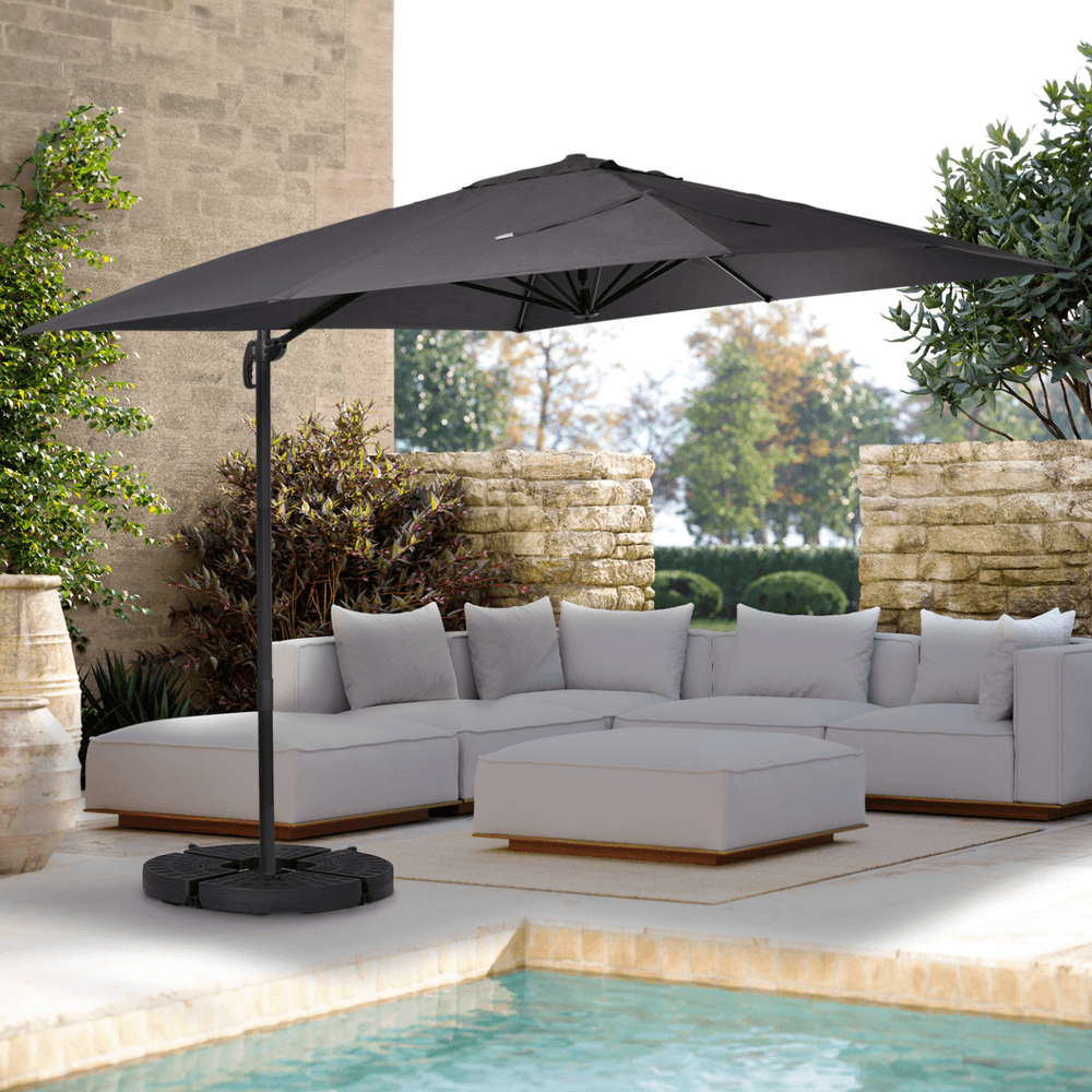 Parasol déporté inclinable rotatif 360 calvi gris 3x3 m avec 4 dalles et housse