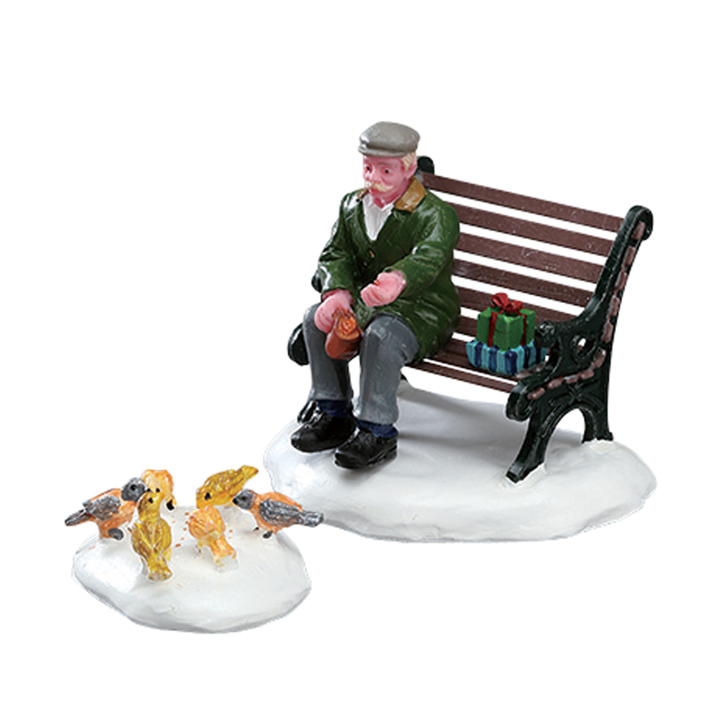 Figurines de Noël : Le vieil homme et l'oiseau