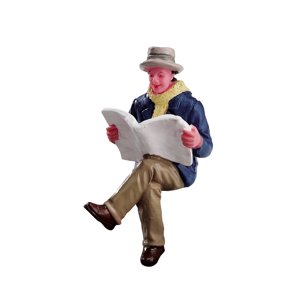 Figurine Lire le journal