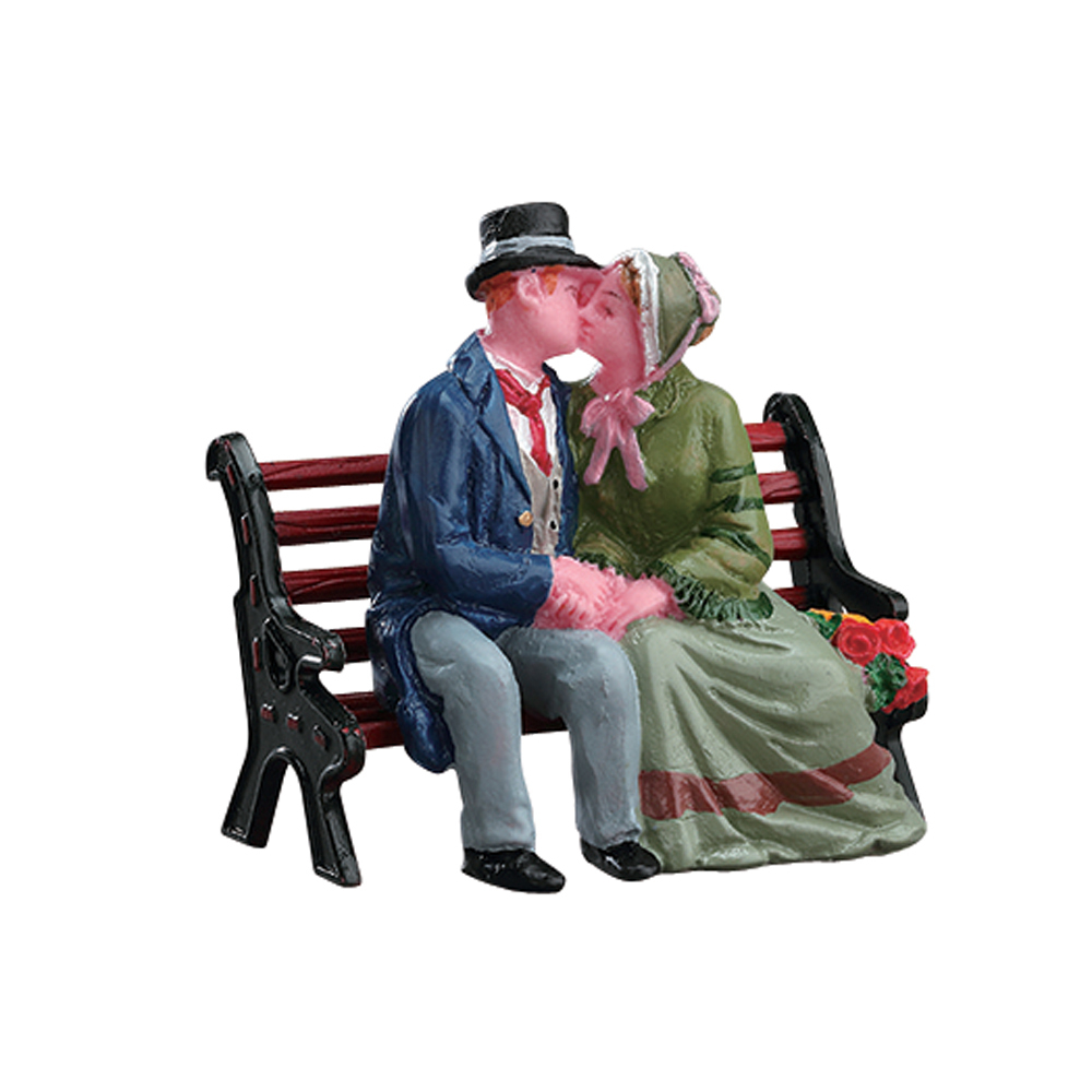 Figurine de Noël : Le baiser sur un banc à Caddington - H.6cm