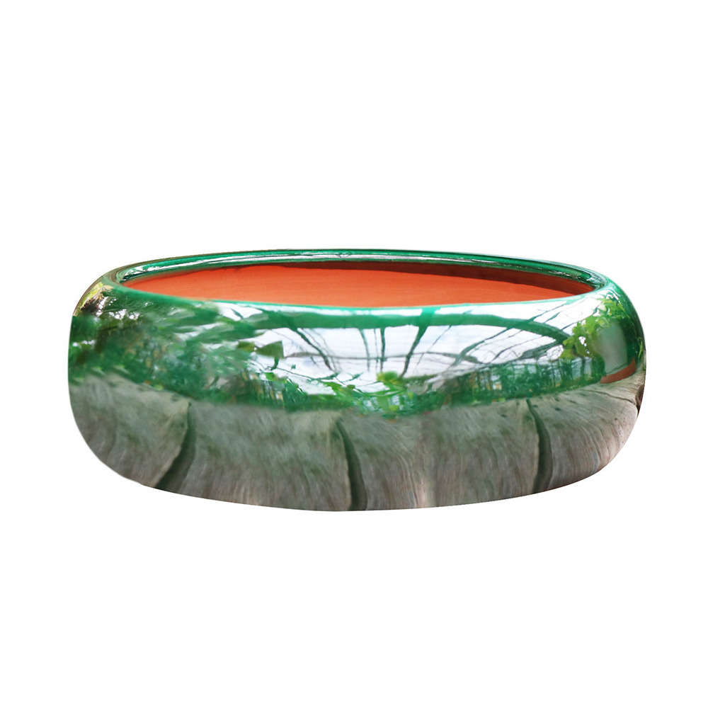 Coupe Plume en terre cuite émaillée, coloris jade D20 cm