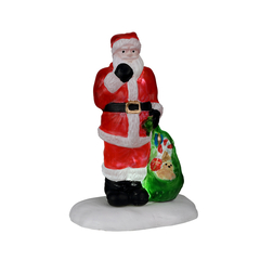 Figurine : Le Père Noel est arrivé avec sa hotte chargée de cadeaux
