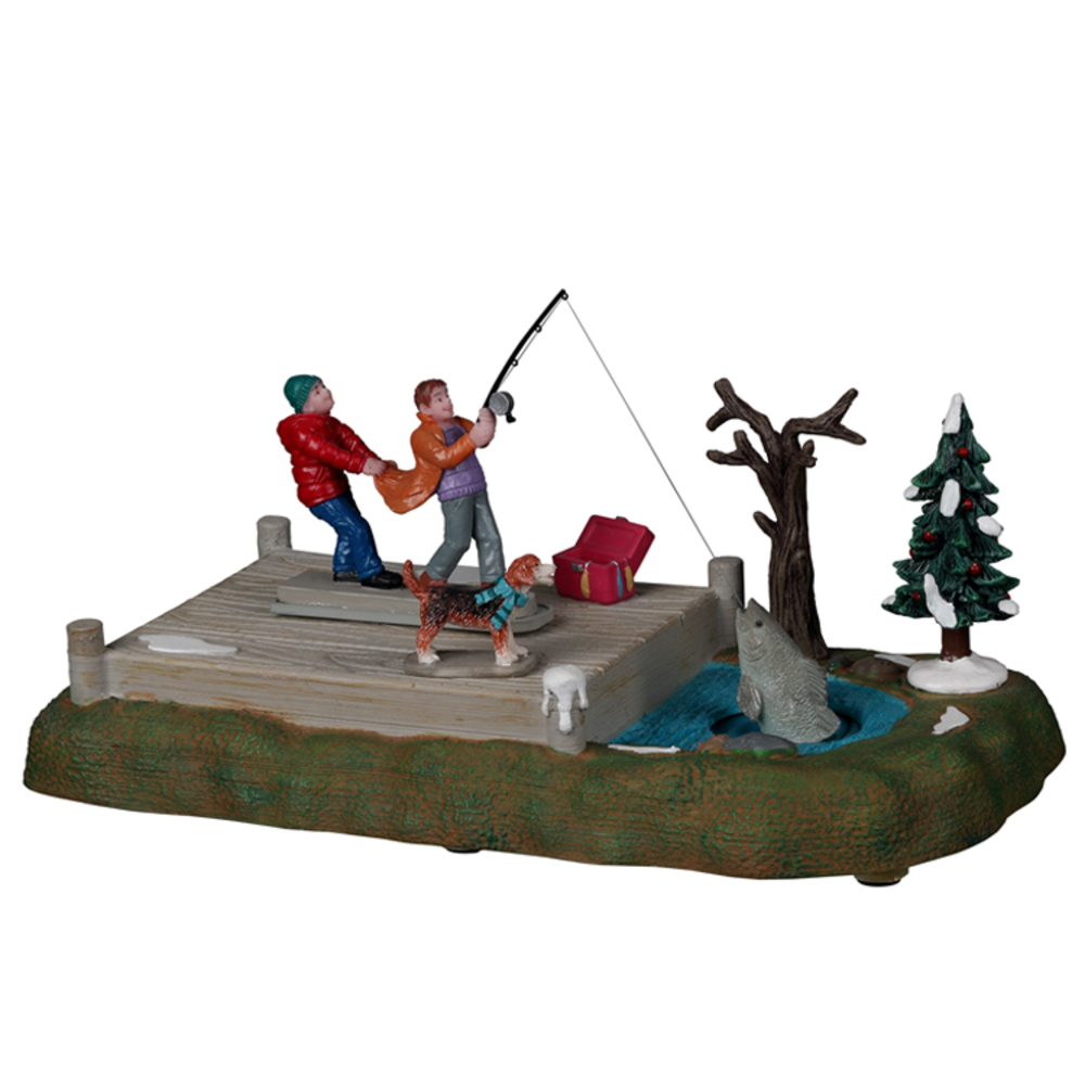Une trop grosse prise à la pêche, scène animée de village de Noël