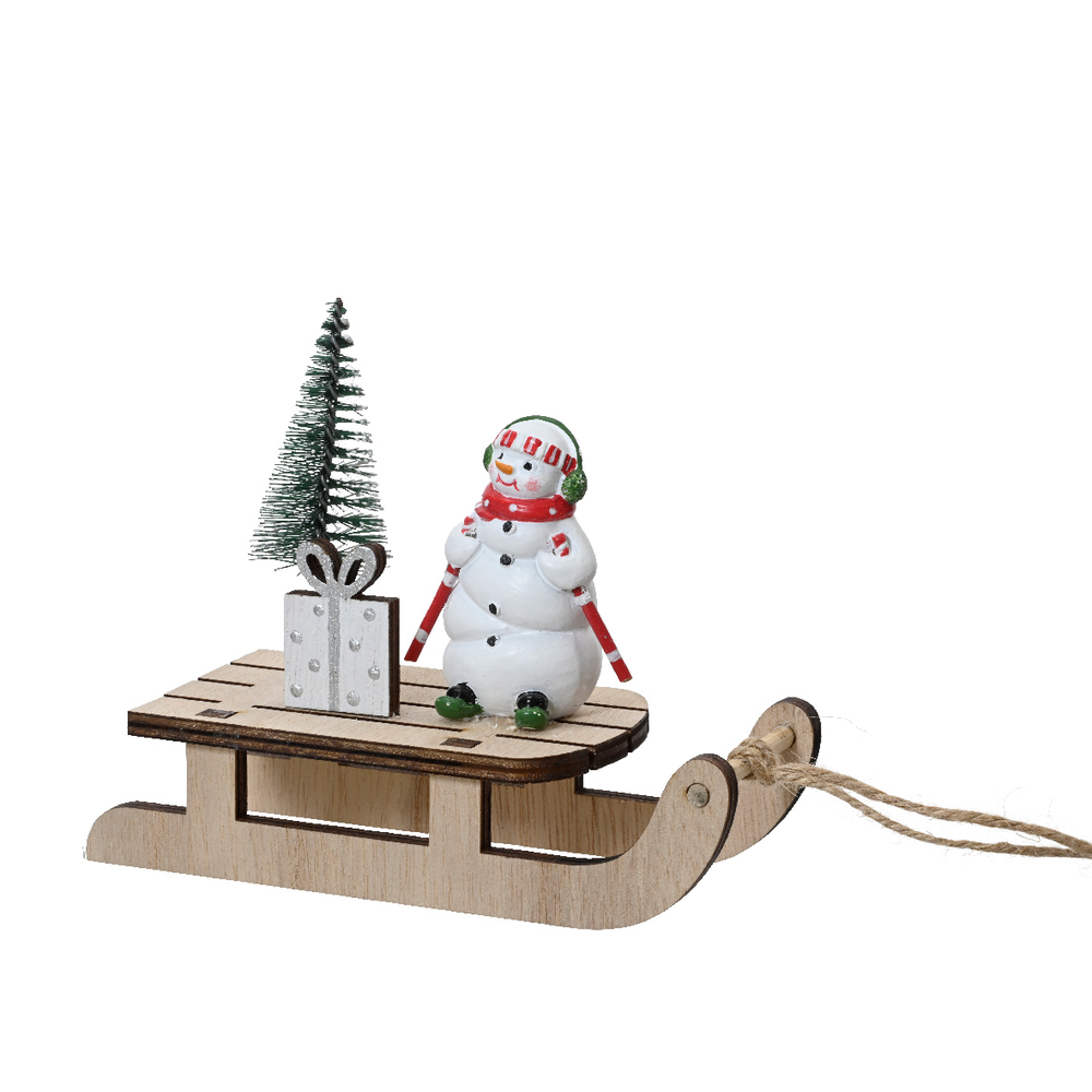 Figurine de Noël en bois : Bonhomme de neige sur son traineau - H.9cm