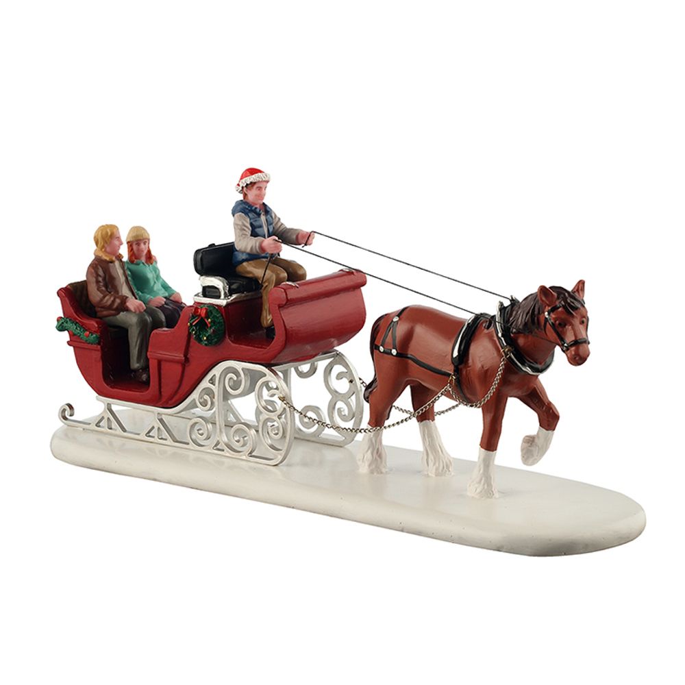 Figurine de Noël : promenade en traîneau pendant les vacances